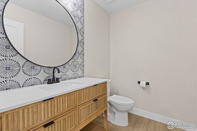 Architectural elegance meets modern luxury in this exceptional on Cattail Creek Golf Course in Colorado - for sale on GolfHomes.com, golf home, golf lot