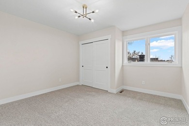 Architectural elegance meets modern luxury in this exceptional on Cattail Creek Golf Course in Colorado - for sale on GolfHomes.com, golf home, golf lot