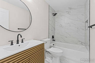 Architectural elegance meets modern luxury in this exceptional on Cattail Creek Golf Course in Colorado - for sale on GolfHomes.com, golf home, golf lot