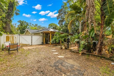 Nestled just a block away from the serene Whitcomb Bayou, this on Tarpon Springs Golf Course in Florida - for sale on GolfHomes.com, golf home, golf lot