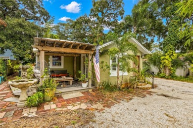 Nestled just a block away from the serene Whitcomb Bayou, this on Tarpon Springs Golf Course in Florida - for sale on GolfHomes.com, golf home, golf lot