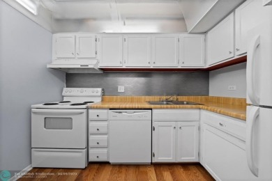 Charming & affordable condo in the desirable guard gated on Inverrary Country Club in Florida - for sale on GolfHomes.com, golf home, golf lot
