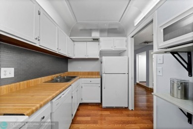 Charming & affordable condo in the desirable guard gated on Inverrary Country Club in Florida - for sale on GolfHomes.com, golf home, golf lot