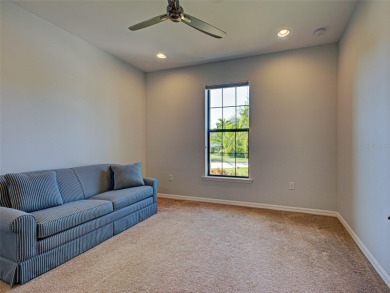 This gorgeous SUMMERWOOD model in ISLANDWALK offers an on Sarasota National Golf Club in Florida - for sale on GolfHomes.com, golf home, golf lot