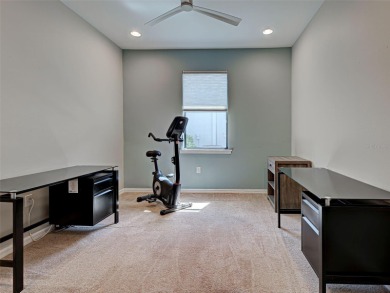 This gorgeous SUMMERWOOD model in ISLANDWALK offers an on Sarasota National Golf Club in Florida - for sale on GolfHomes.com, golf home, golf lot