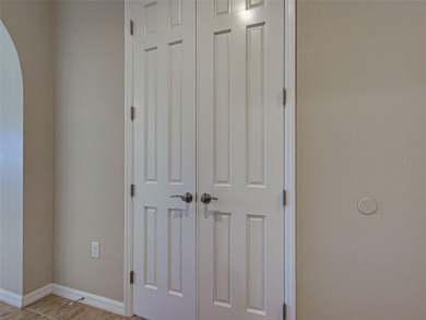 This gorgeous SUMMERWOOD model in ISLANDWALK offers an on Sarasota National Golf Club in Florida - for sale on GolfHomes.com, golf home, golf lot