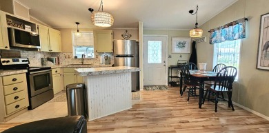 Modern and Updated 2 bedroom 2 bath home WITH EXTRAS in 55 + on Zephyrhills Municipal Golf Course in Florida - for sale on GolfHomes.com, golf home, golf lot