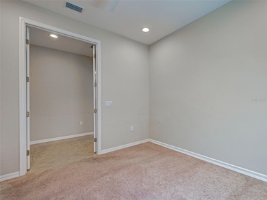 This gorgeous SUMMERWOOD model in ISLANDWALK offers an on Sarasota National Golf Club in Florida - for sale on GolfHomes.com, golf home, golf lot