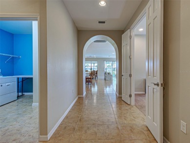 This gorgeous SUMMERWOOD model in ISLANDWALK offers an on Sarasota National Golf Club in Florida - for sale on GolfHomes.com, golf home, golf lot