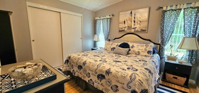 Modern and Updated 2 bedroom 2 bath home WITH EXTRAS in 55 + on Zephyrhills Municipal Golf Course in Florida - for sale on GolfHomes.com, golf home, golf lot