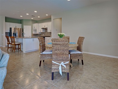 This gorgeous SUMMERWOOD model in ISLANDWALK offers an on Sarasota National Golf Club in Florida - for sale on GolfHomes.com, golf home, golf lot