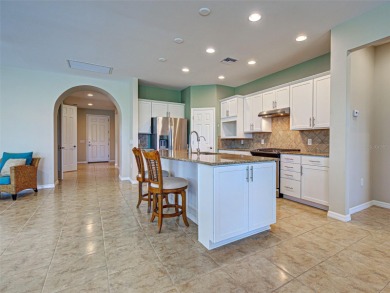 This gorgeous SUMMERWOOD model in ISLANDWALK offers an on Sarasota National Golf Club in Florida - for sale on GolfHomes.com, golf home, golf lot