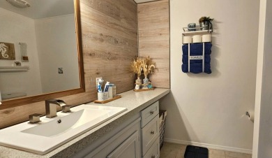 Modern and Updated 2 bedroom 2 bath home WITH EXTRAS in 55 + on Zephyrhills Municipal Golf Course in Florida - for sale on GolfHomes.com, golf home, golf lot