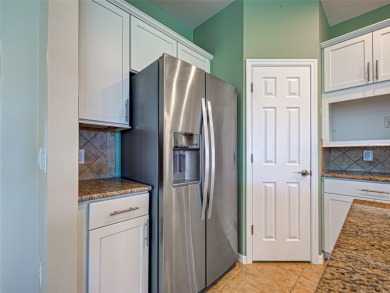 This gorgeous SUMMERWOOD model in ISLANDWALK offers an on Sarasota National Golf Club in Florida - for sale on GolfHomes.com, golf home, golf lot