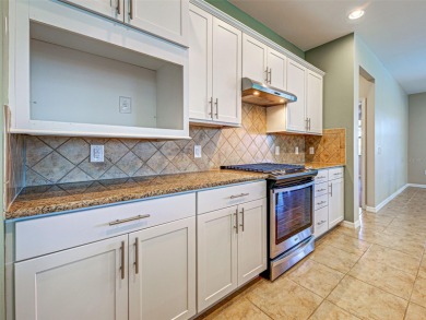 This gorgeous SUMMERWOOD model in ISLANDWALK offers an on Sarasota National Golf Club in Florida - for sale on GolfHomes.com, golf home, golf lot