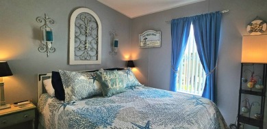 Modern and Updated 2 bedroom 2 bath home WITH EXTRAS in 55 + on Zephyrhills Municipal Golf Course in Florida - for sale on GolfHomes.com, golf home, golf lot