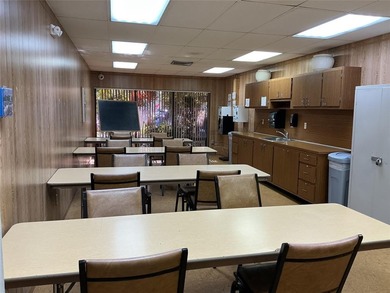 Discover exceptional value & endless potential in this first on Sunrise Lakes Phase III in Florida - for sale on GolfHomes.com, golf home, golf lot