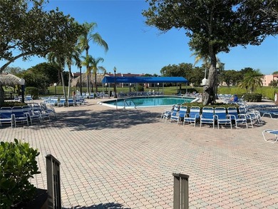 Discover exceptional value & endless potential in this first on Sunrise Lakes Phase III in Florida - for sale on GolfHomes.com, golf home, golf lot