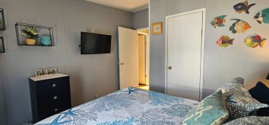 Modern and Updated 2 bedroom 2 bath home WITH EXTRAS in 55 + on Zephyrhills Municipal Golf Course in Florida - for sale on GolfHomes.com, golf home, golf lot