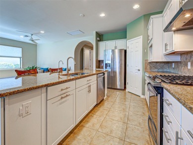 This gorgeous SUMMERWOOD model in ISLANDWALK offers an on Sarasota National Golf Club in Florida - for sale on GolfHomes.com, golf home, golf lot