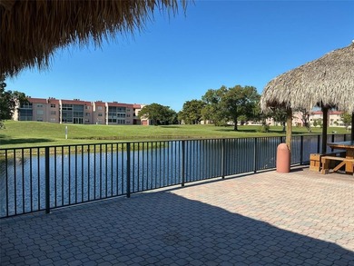 Discover exceptional value & endless potential in this first on Sunrise Lakes Phase III in Florida - for sale on GolfHomes.com, golf home, golf lot