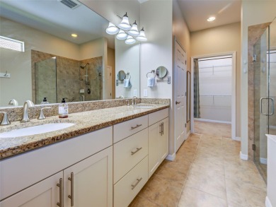 This gorgeous SUMMERWOOD model in ISLANDWALK offers an on Sarasota National Golf Club in Florida - for sale on GolfHomes.com, golf home, golf lot