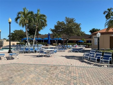 Discover exceptional value & endless potential in this first on Sunrise Lakes Phase III in Florida - for sale on GolfHomes.com, golf home, golf lot