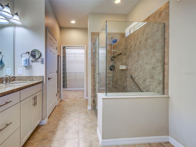 This gorgeous SUMMERWOOD model in ISLANDWALK offers an on Sarasota National Golf Club in Florida - for sale on GolfHomes.com, golf home, golf lot