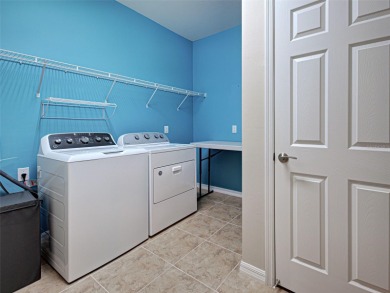 This gorgeous SUMMERWOOD model in ISLANDWALK offers an on Sarasota National Golf Club in Florida - for sale on GolfHomes.com, golf home, golf lot