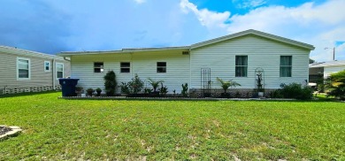 Modern and Updated 2 bedroom 2 bath home WITH EXTRAS in 55 + on Zephyrhills Municipal Golf Course in Florida - for sale on GolfHomes.com, golf home, golf lot