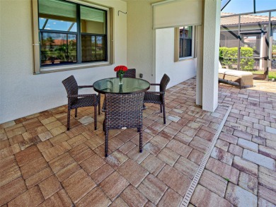 This gorgeous SUMMERWOOD model in ISLANDWALK offers an on Sarasota National Golf Club in Florida - for sale on GolfHomes.com, golf home, golf lot