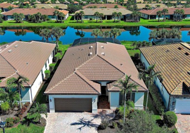This gorgeous SUMMERWOOD model in ISLANDWALK offers an on Sarasota National Golf Club in Florida - for sale on GolfHomes.com, golf home, golf lot