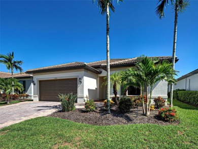 This gorgeous SUMMERWOOD model in ISLANDWALK offers an on Sarasota National Golf Club in Florida - for sale on GolfHomes.com, golf home, golf lot