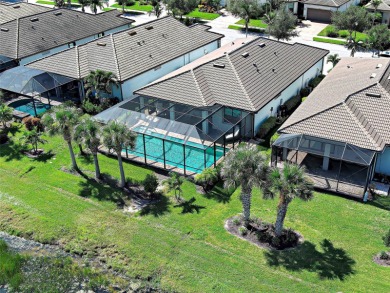 This gorgeous SUMMERWOOD model in ISLANDWALK offers an on Sarasota National Golf Club in Florida - for sale on GolfHomes.com, golf home, golf lot