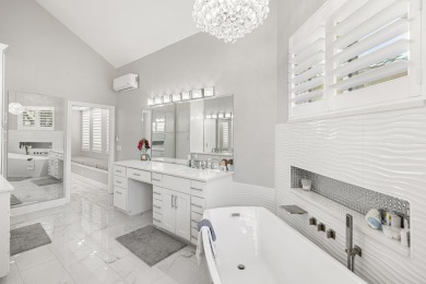Located on a premium lot backing to the 15th hole of the Emerald on Emerald Bay Golf Club in Florida - for sale on GolfHomes.com, golf home, golf lot