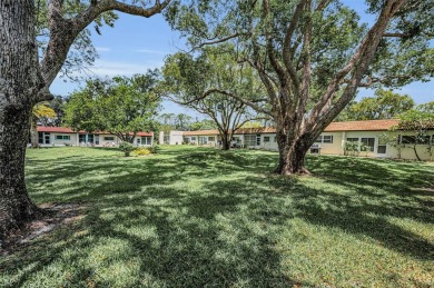 Beautiful Villa in Desirable Mission Grove Highland Lakes in on Highland Lakes Executive Golf Course in Florida - for sale on GolfHomes.com, golf home, golf lot
