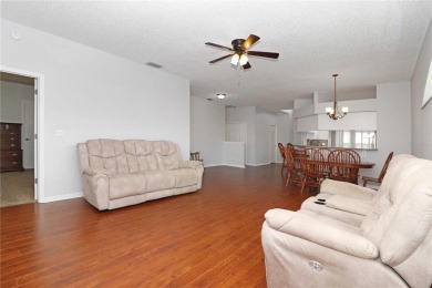 Discover this highly sought-after Opal model in Royal Highlands on Monarch At Royal Highlands in Florida - for sale on GolfHomes.com, golf home, golf lot