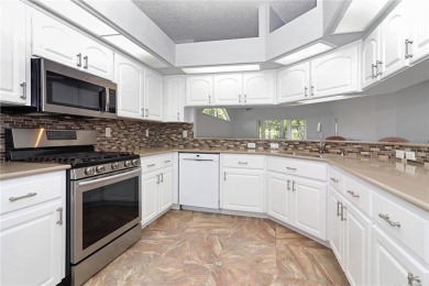 Discover this highly sought-after Opal model in Royal Highlands on Monarch At Royal Highlands in Florida - for sale on GolfHomes.com, golf home, golf lot