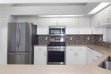 Discover this highly sought-after Opal model in Royal Highlands on Monarch At Royal Highlands in Florida - for sale on GolfHomes.com, golf home, golf lot