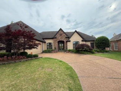 A fee is extra for membership to TPC Clubhouse, including dining on TPC at Southwind in Tennessee - for sale on GolfHomes.com, golf home, golf lot