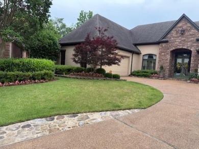 A fee is extra for membership to TPC Clubhouse, including dining on TPC at Southwind in Tennessee - for sale on GolfHomes.com, golf home, golf lot