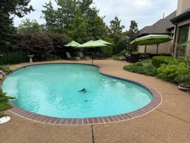 A fee is extra for membership to TPC Clubhouse, including dining on TPC at Southwind in Tennessee - for sale on GolfHomes.com, golf home, golf lot
