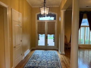 A fee is extra for membership to TPC Clubhouse, including dining on TPC at Southwind in Tennessee - for sale on GolfHomes.com, golf home, golf lot