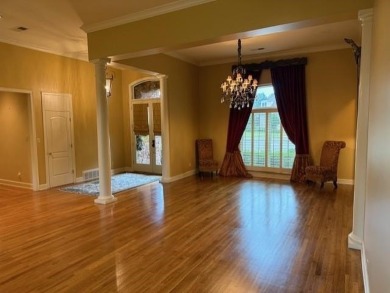 A fee is extra for membership to TPC Clubhouse, including dining on TPC at Southwind in Tennessee - for sale on GolfHomes.com, golf home, golf lot