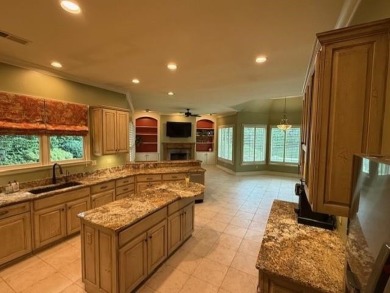 A fee is extra for membership to TPC Clubhouse, including dining on TPC at Southwind in Tennessee - for sale on GolfHomes.com, golf home, golf lot