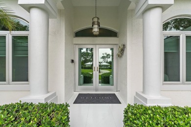 Welcome to this beautiful modern waterfront home with private on The Bears Club in Florida - for sale on GolfHomes.com, golf home, golf lot