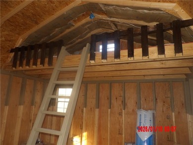 Enjoy this weekend/vacation retreat nestled in the trees on 2 on Sugar Valley Lakes Golf Course in Kansas - for sale on GolfHomes.com, golf home, golf lot