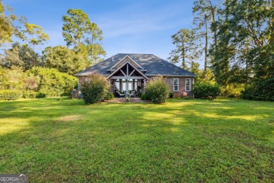 Discover your dream home nestled alongside the stunning 8th hole on The Club At Osprey Cove in Georgia - for sale on GolfHomes.com, golf home, golf lot