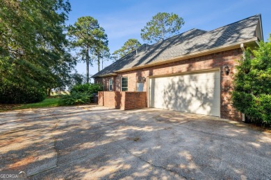 Discover your dream home nestled alongside the stunning 8th hole on The Club At Osprey Cove in Georgia - for sale on GolfHomes.com, golf home, golf lot