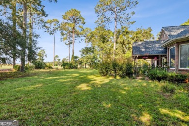 Discover your dream home nestled alongside the stunning 8th hole on The Club At Osprey Cove in Georgia - for sale on GolfHomes.com, golf home, golf lot